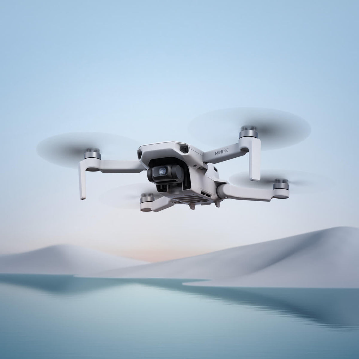 DJI Mini 4K en vuelo con cámara 4K para fotografía y video aéreo
