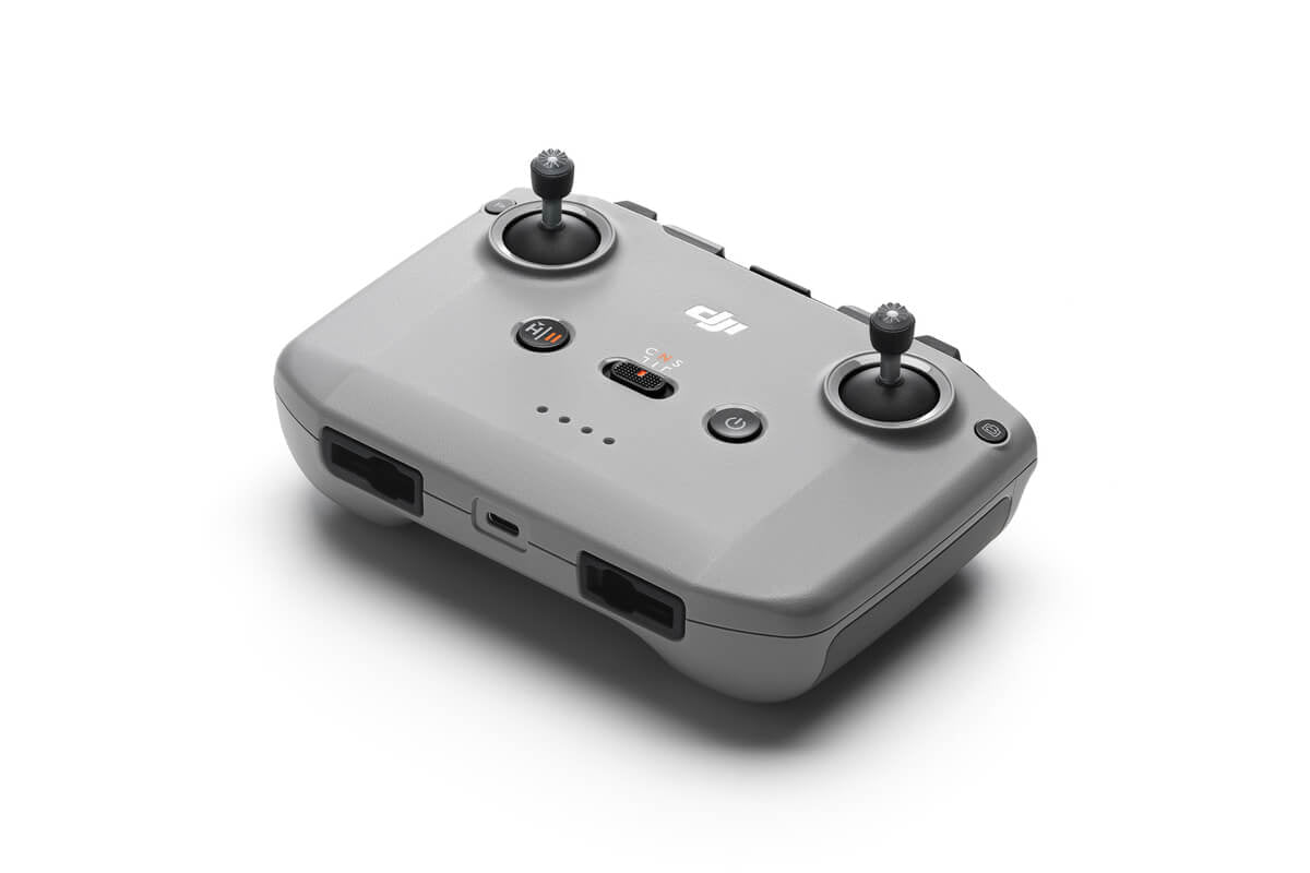 Control remoto DJI RC-N3 visto de lado con soporte integrado para smartphone